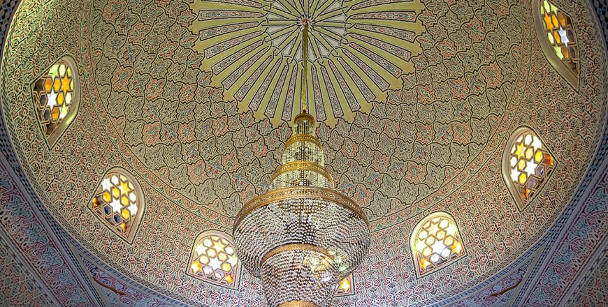 Beautiful ceiling in Islamic, Muslim style with a large chandelier.