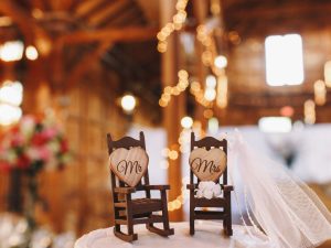 Wedding cake decor made in the for of two rocking chairs